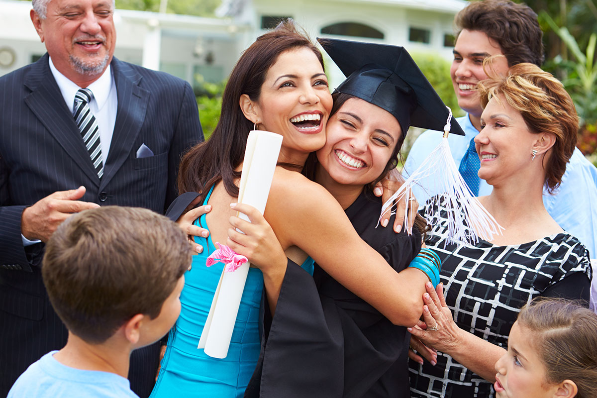 graduate with family